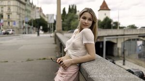 Cassandra - Walking in the city with slightly Sheer Top